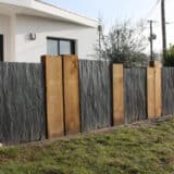 Clôture en palis d'ardoise et bois